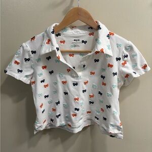 Maeve Cropped White Polo Shirt with Colorful Bow Print